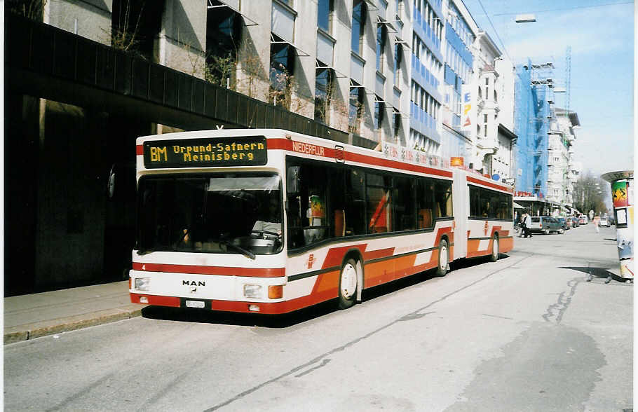 (030'109) - ABM Meinisberg - Nr. 4/BE 61'024 - MAN (ex Nr. 6) am 13. Mrz 1999 beim Bahnhof Biel