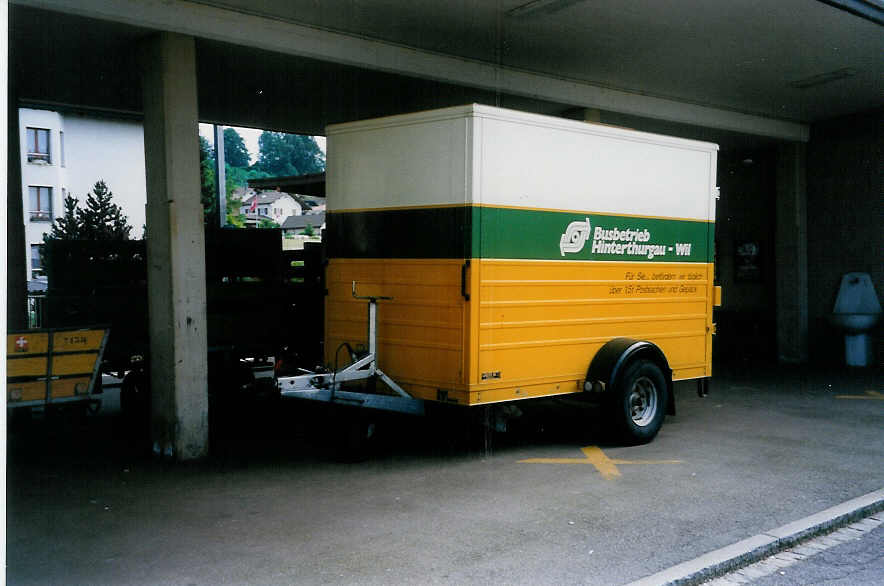 (031'714) - BHW Wil - TG 551 - Reuter Gepckanhnger am 30. Mai 1999 beim Bahnhof Sirnach