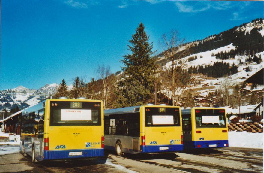 (113'319) - AFA Adelboden - Nr. 55/BE 611'055 + Nr. 56/BE 611'030 - MAN/Gppel + Nr. 53/BE 611'224 - Mercedes (ex VAG D-Freiburg Nr. 825) am 24. Dezember 2008 beim Bahnhof Lenk