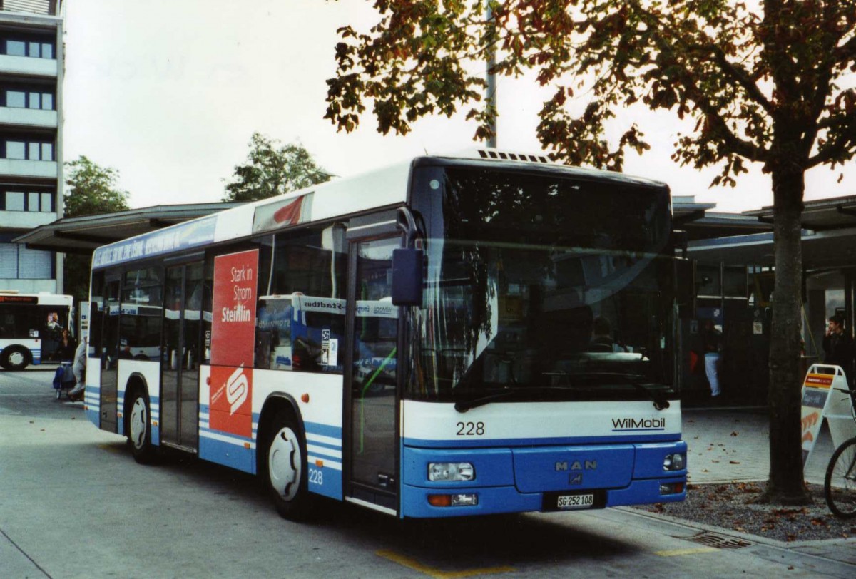 (121'310) - WilMobil, Wil - Nr. 228/SG 252'108 - MAN (ex Wick, Wil Nr. 8) am 23. September 2009 beim Bahnhof Wil