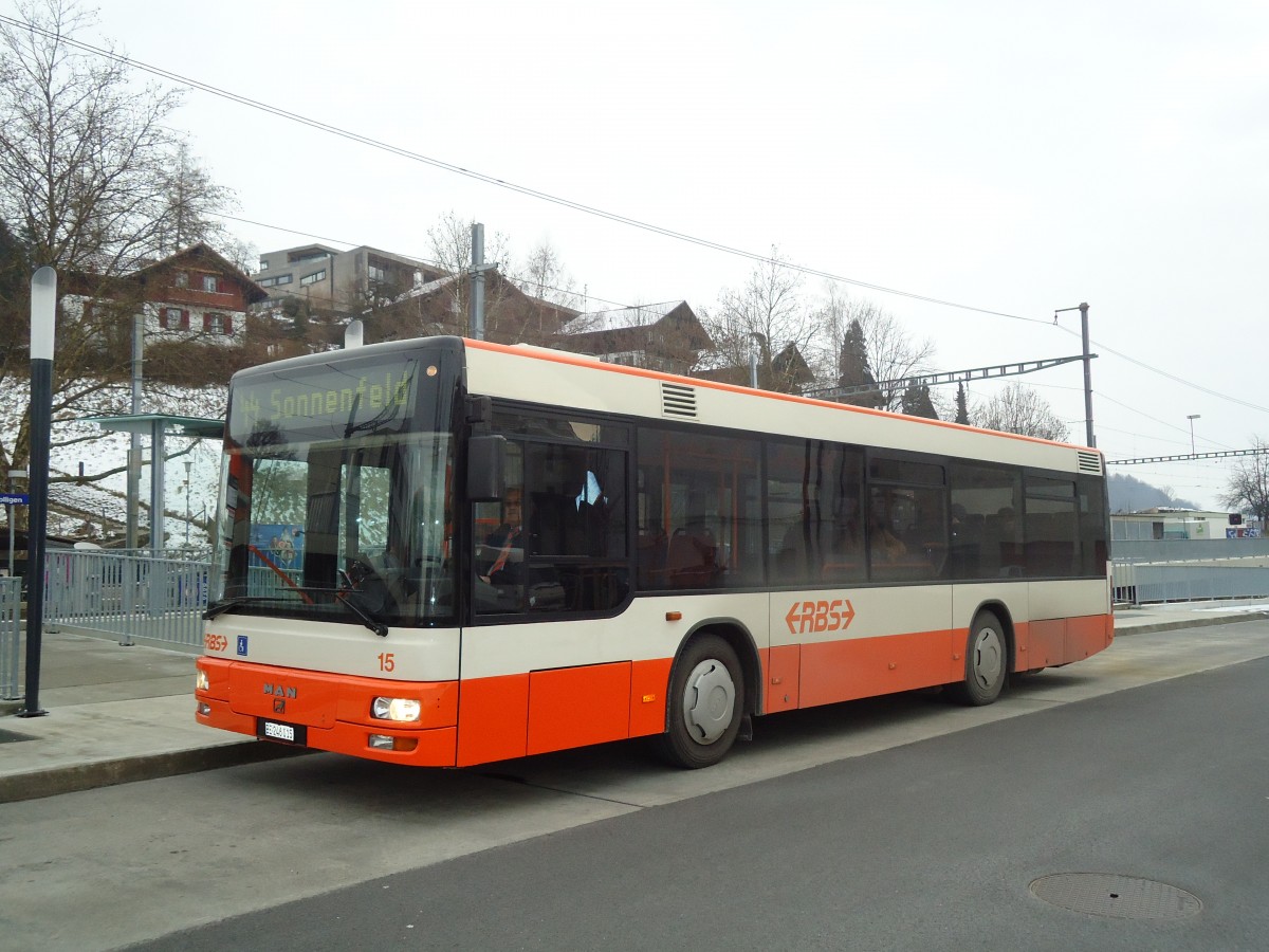 (132'415) - RBS Worblaufen - Nr. 15/BE 246'015 - MAN/Gppel am 24. Januar 2011 beim Bahnhof Bolligen