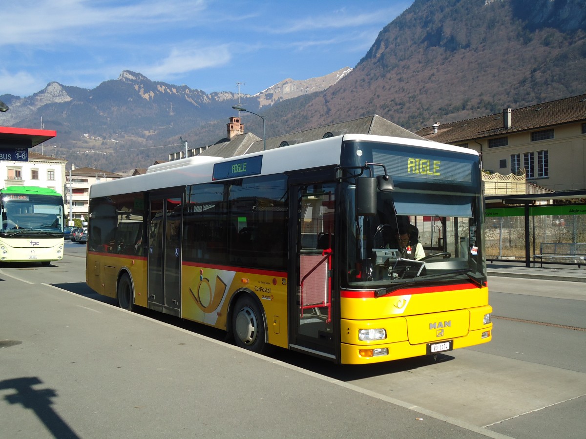 (132'616) - TPC Aigle - VD 1174 - MAN/Gppel am 19. Februar 2011 beim Bahnhof Aigle