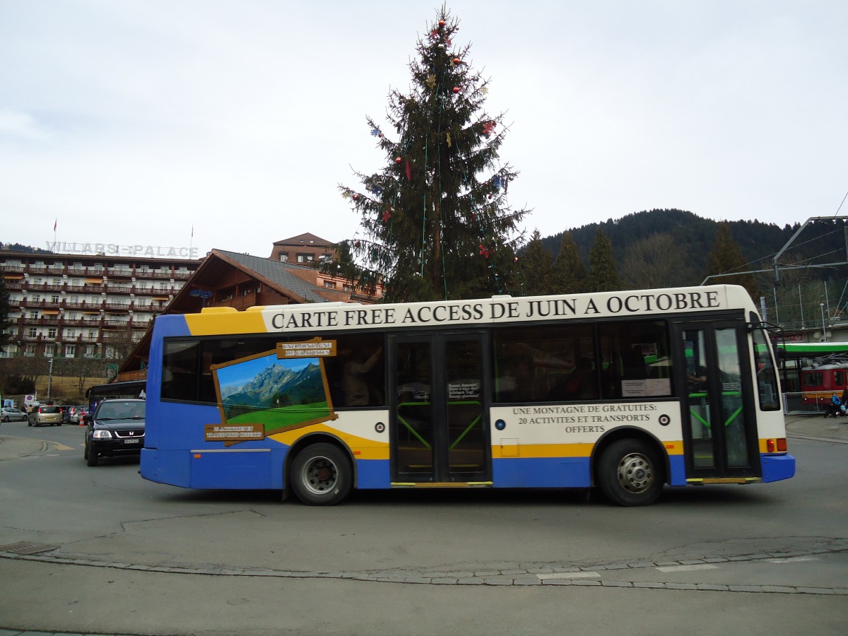 (132'632) - Bonzon, Villars - VD 297'746 - Volvo/Berkhof (ex TC La Chaux-de-Fonds Nr. 192) am 19. Februar 2011 beim Bahnhof Villars-sur-Ollon