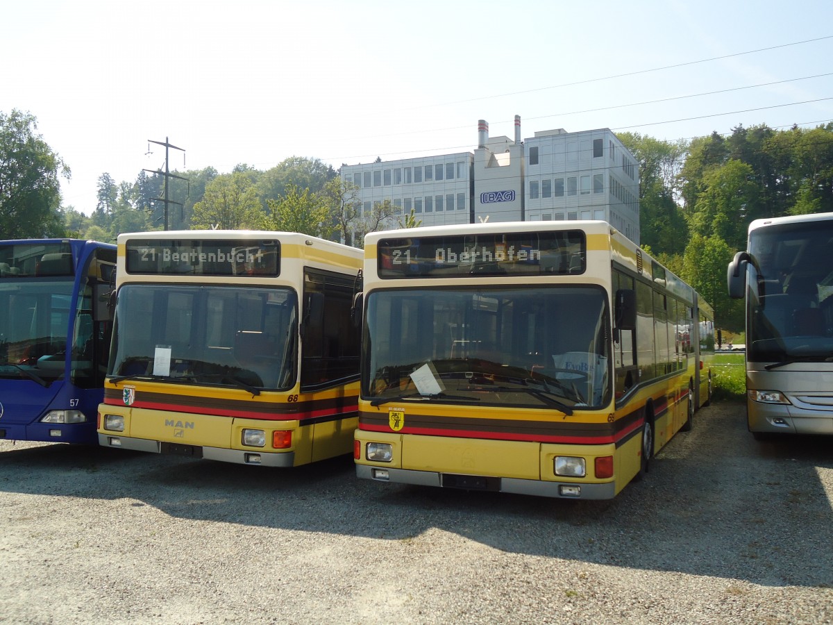 (133'422) - STI Thun - Nr. 69 + Nr. 68 - MAN am 25. April 2011 in Kloten, EvoBus