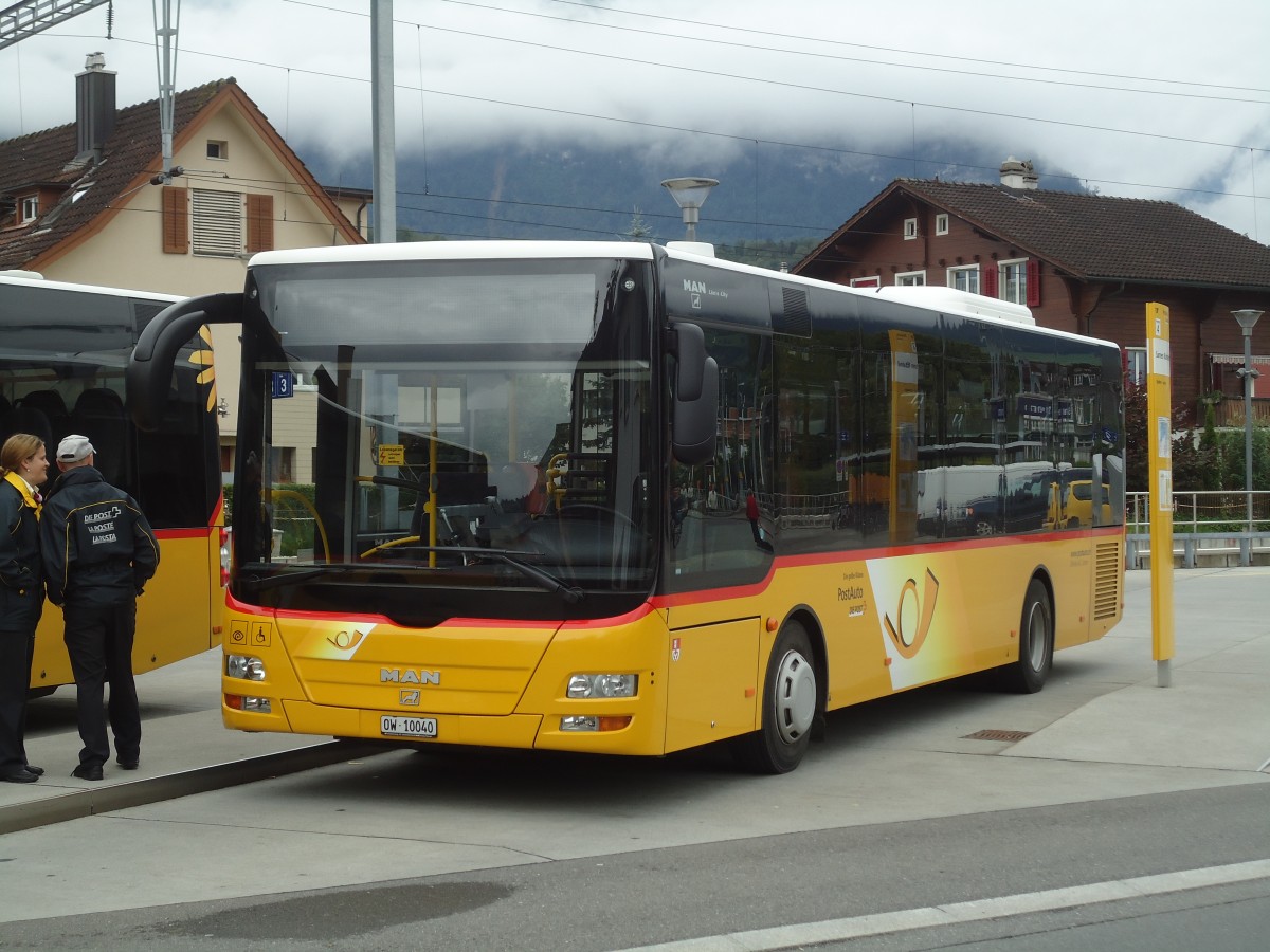 (134'155) - Dillier, Sarnen - Nr. 7/OW 10'040 - MAN/Gppel am 11. Juni 2011 beim Bahnhof Sarnen