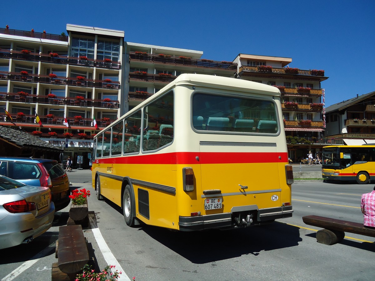 (134'754) - AVG Meiringen - Nr. 74/BE 607'481 - Saurer/R&J (ex P 24'357) am 3. Juli 2011 beim Bahnhof Grindelwald