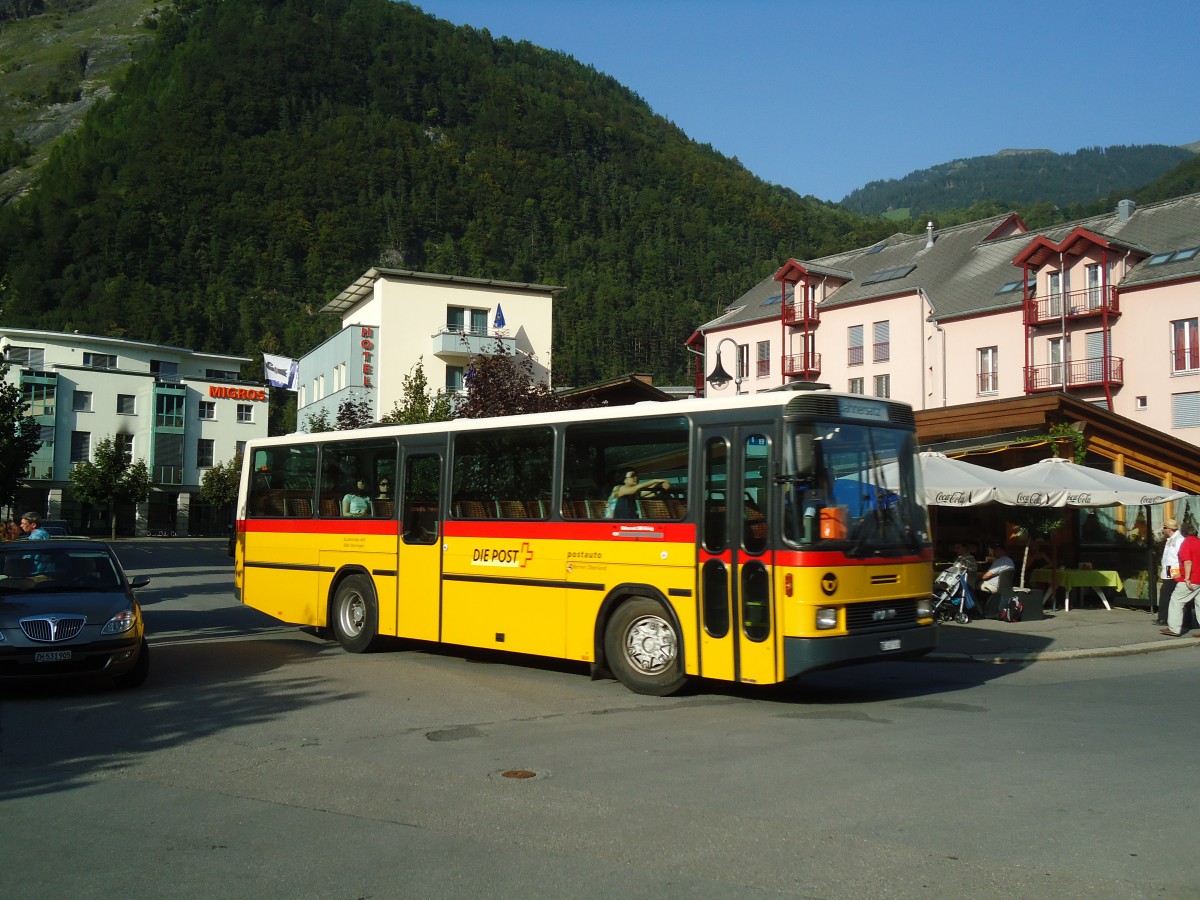 (135'755) - AVG Meiringen - Nr. 68/BE 401'568 - NAW/Hess (ex P 24'454) am 21. August 2011 beim Bahnhof Meiringen