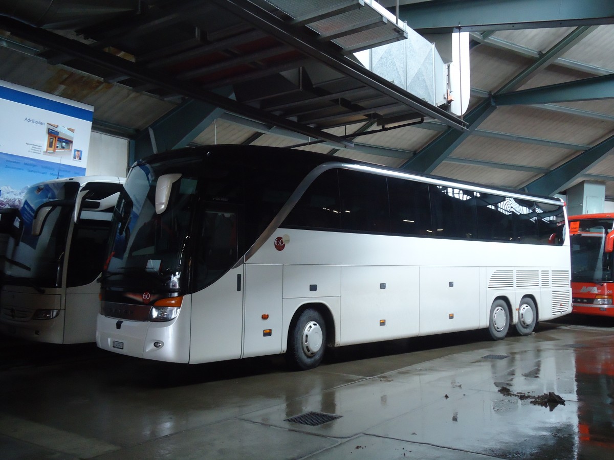 (137'542) - EvoBus, Kloten - ZH 410'937 - Setra am 7. Januar 2012 im Autobahnhof Adelboden