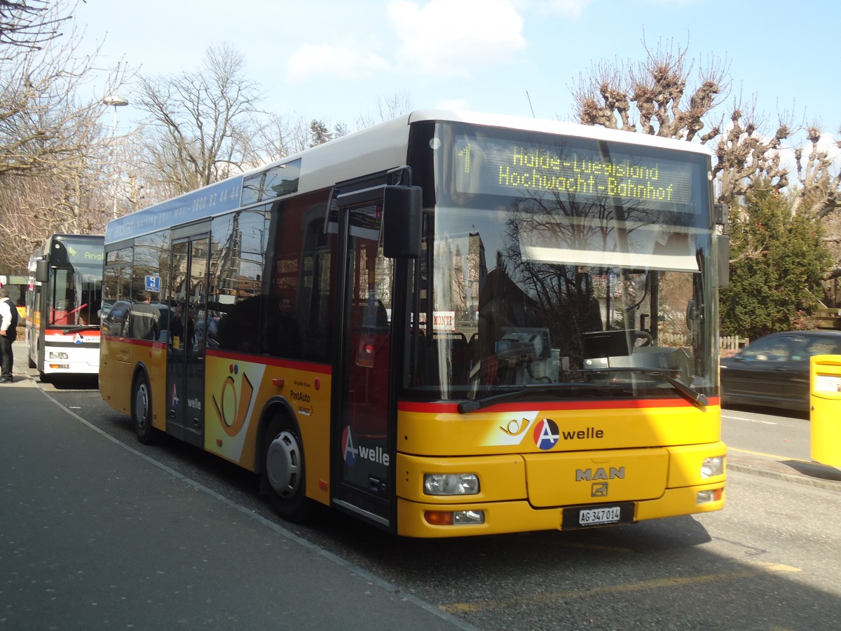 (138'064) - Geissmann, Hgglingen - AG 347'014 - MAN am 6. Mrz 2012 beim Bahnhof Wohlen