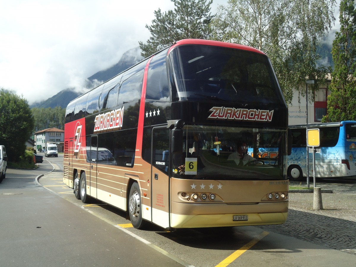 (139'368) - Zurkirchen, Malters - LU 169'911 - Neoplan am 11. Juni 2012 beim Bahnhof Flelen