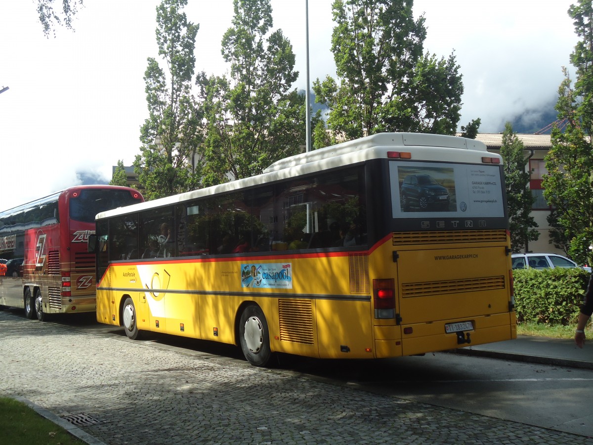 (139'384) - Marchetti, Airolo - TI 183'247 - Setra (ex Nr. 6) am 11. Juni 2012 beim Bahnhof Flelen