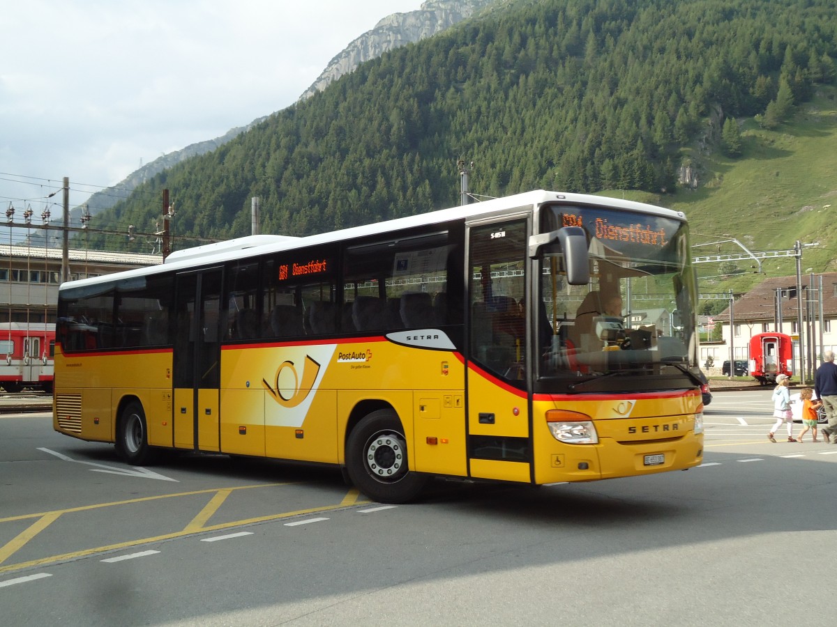 (145'981) - PostAuto Bern - BE 653'387 - Setra am 20. Juli 2013 beim Bahnhof Andermatt