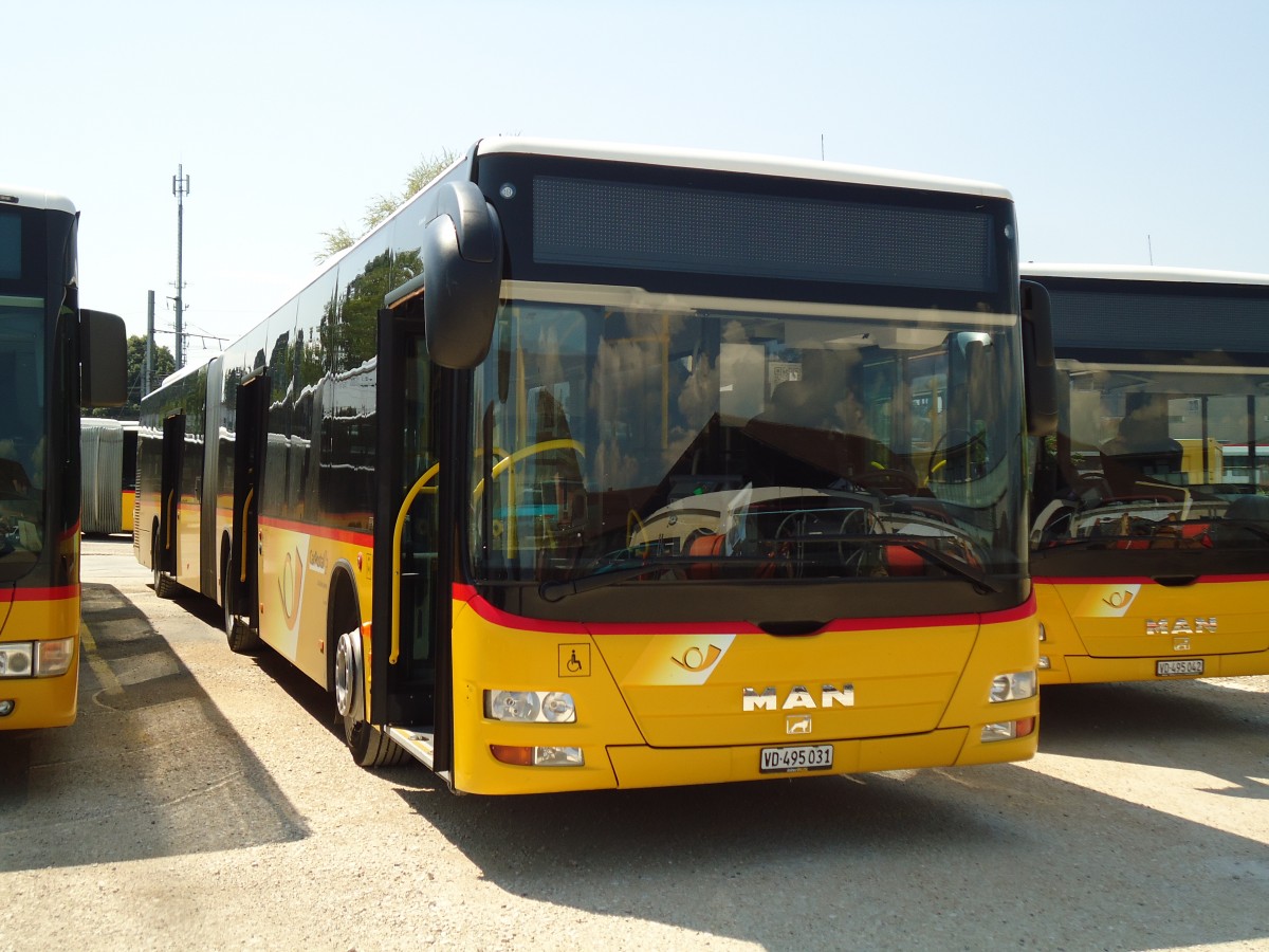 (146'014) - CarPostal Ouest - VD 495'031 - MAN am 22. Juli 2013 in Yverdon, Garage