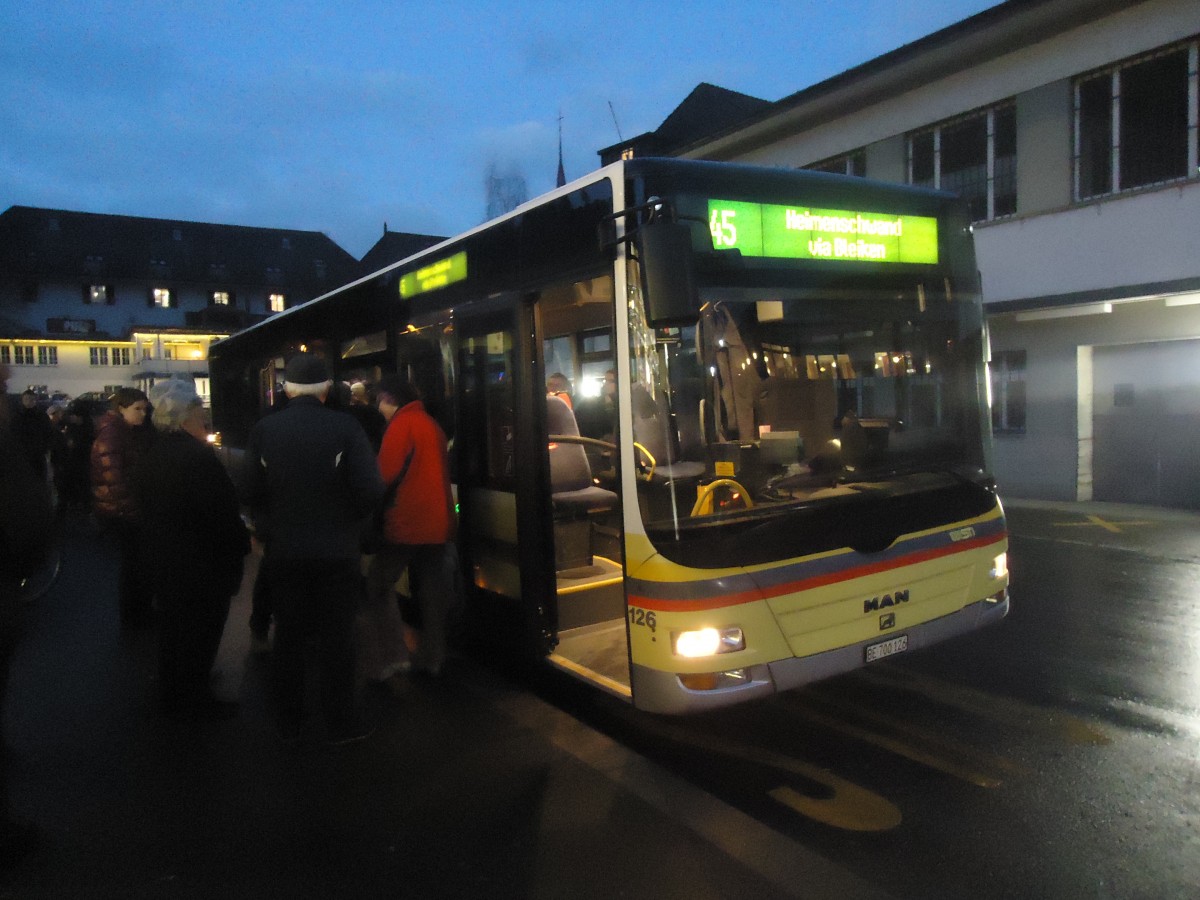 (148'308) - STI Thun - Nr. 126/BE 700'126 - MAN am 14. Dezember 2013 beim Bahnhof Oberdiessbach