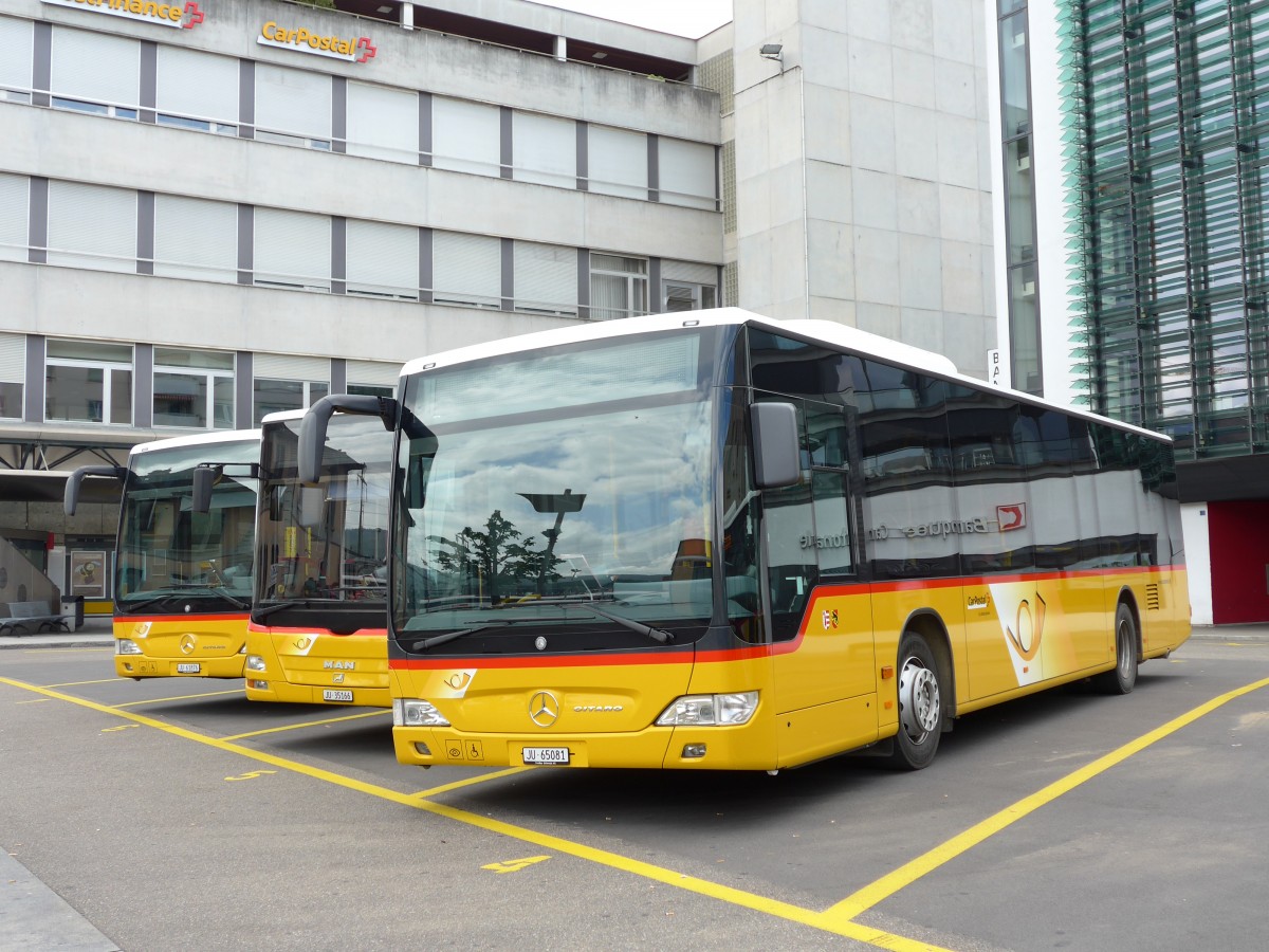 (151'050) - CarPostal Ouest - Nr. 14/JU 65'081 - Mercedes am 29. Mai 2014 in Delmont, Place de la Poste