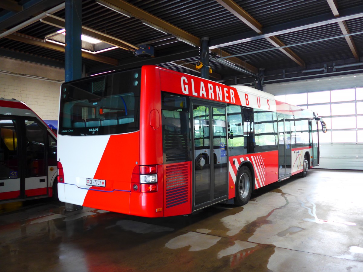 (151'807) - AS Engi - Nr. 2/GL 7702 - MAN (ex WilMobil, Wil Nr. 255; ex Vorfhrfahrzeug) am 23. Juni 2014 in Engi, Garage