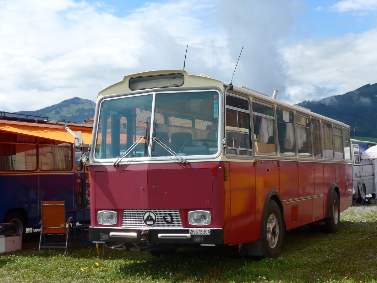 (153'765) - Niederer F., Langwiesen - ZH 572'304 - Saurer/Tscher (ex Solr+Fontana, Ilanz) am 16. August 2014 in Altsttten, Allmendplatz