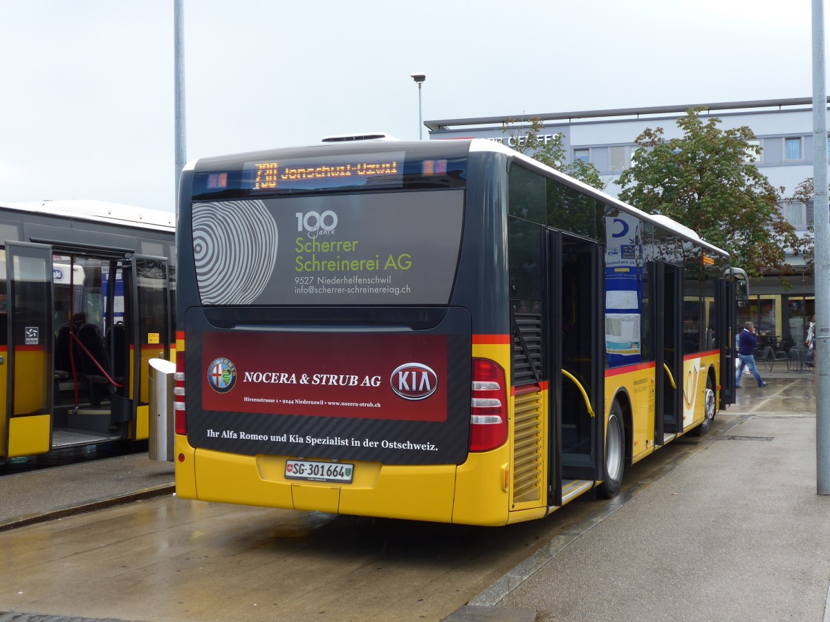 (153'927) - Schmidt, Oberbren - SG 301'664 - Mercedes am 16. August 2014 beim Bahnhof Wil