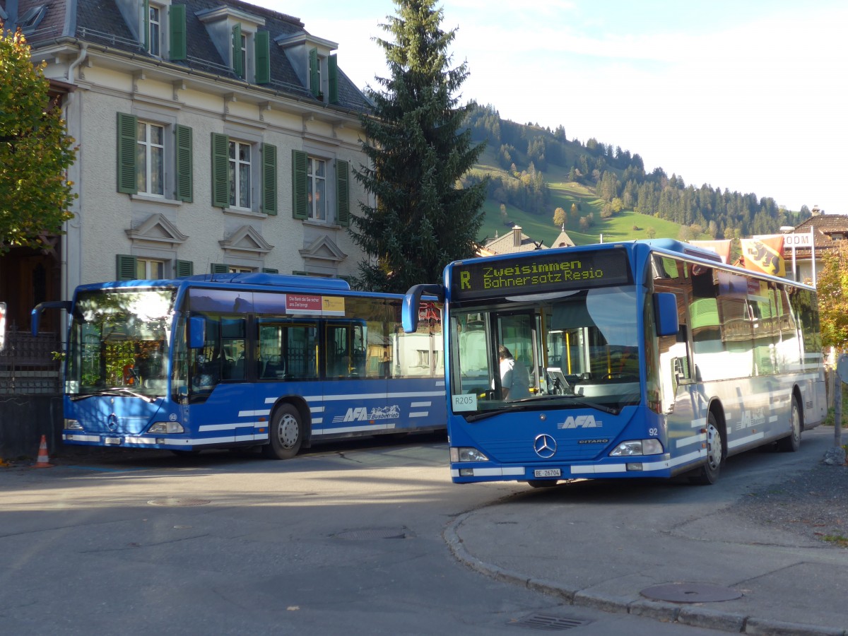 (155'873) - AFA Adelboden - Nr. 93/BE 26'705 - Mercedes (ex Nr. 5) + Nr. 92/BE 26'704 - Mercedes (ex Nr. 4) am 19. Oktober 2014 beim Bahnhof Zweisimmen