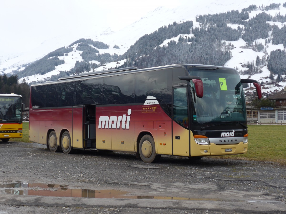 (158'355) - Marti, Kallnach - Nr. 14/BE 572'214 - Setra am 11. Januar 2015 in Frutigen, Flugplatz