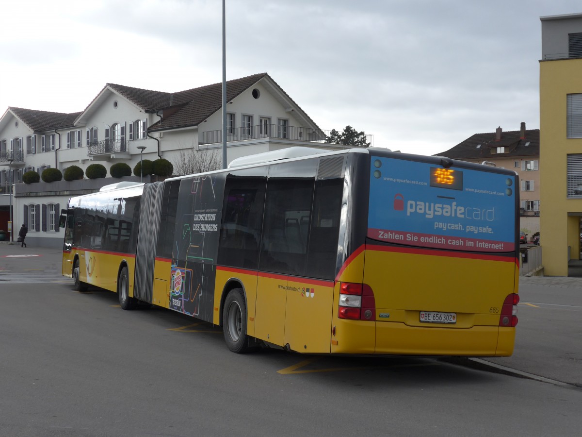 (158'940) - PostAuto Bern - Nr. 665/BE 656'302 - MAN am 2. Mrz 2015 beim Bahnhof Lyss