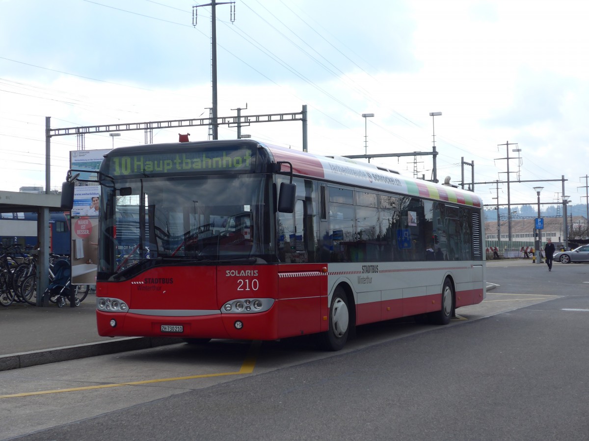 (159'448) - SW Winterthur - Nr. 210/ZH 730'210 - Solaris am 27. Mrz 2015 beim Bahnhof Oberwinterthur