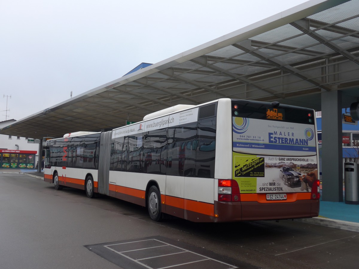 (168'187) - Bamert, Wollerau - SZ 24'744 - MAN (ex Vorfhrfahrzeug) am 1. Januar 2016 beim Bahnhof Horgen