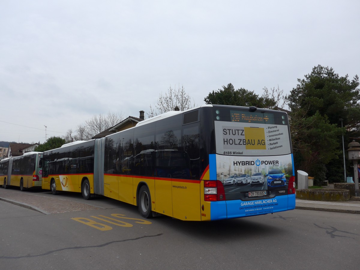 (168'884) - PostAuto Zrich - Nr. 313/ZH 780'682 - MAN am 24. Februar 2016 beim Bahnhof Blach