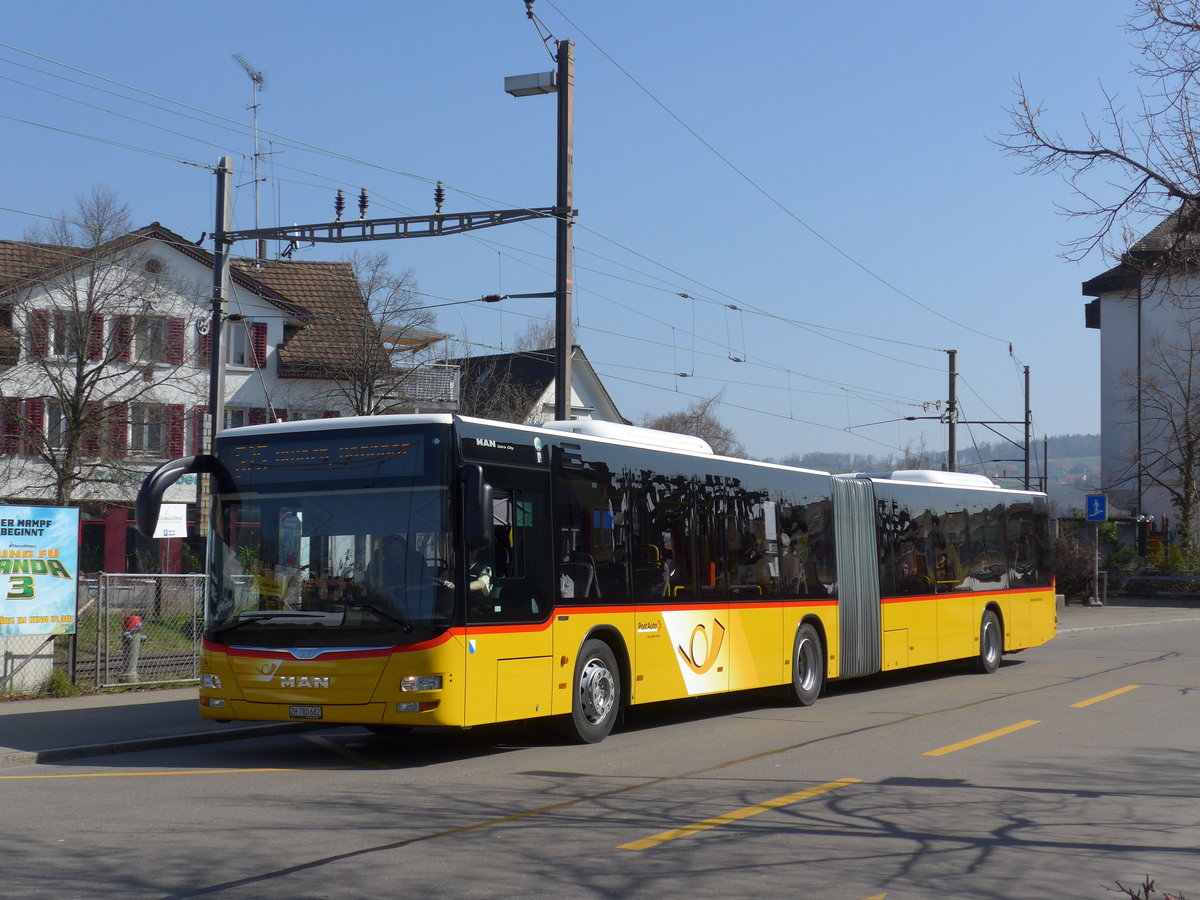 (169'313) - PostAuto Zrich - Nr. 313/ZH 780'682 - MAN am 19. Mrz 2016 beim Bahnhof Blach