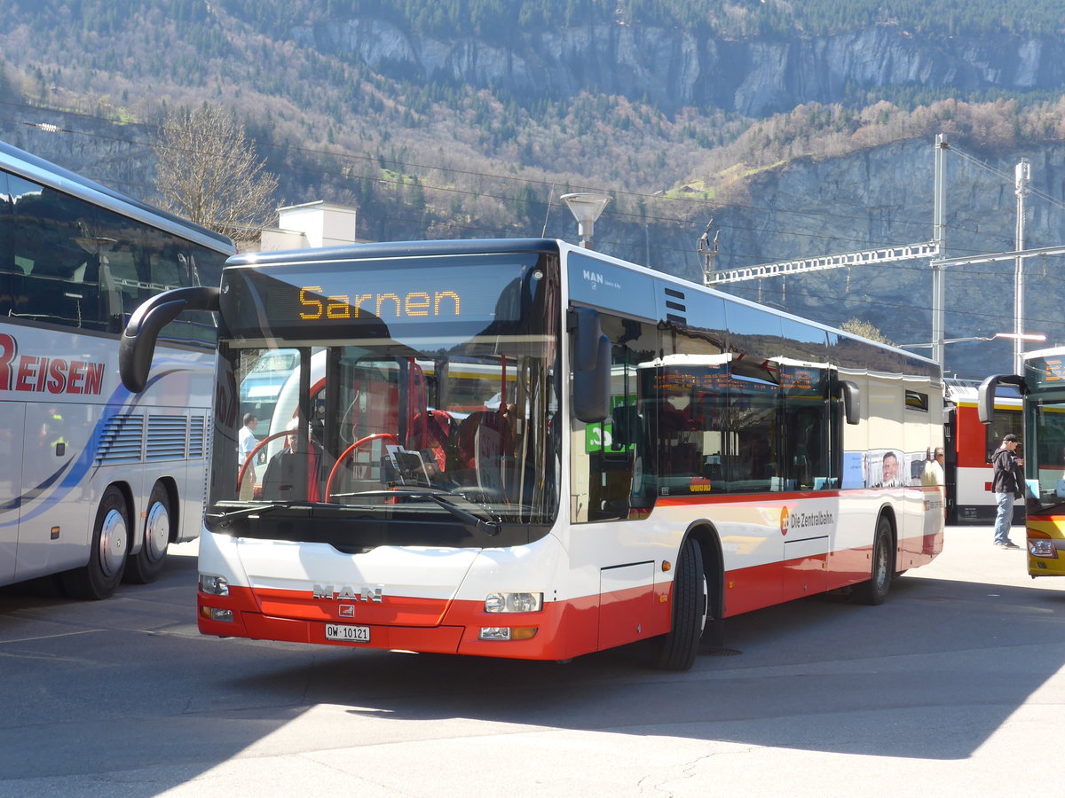 (169'818) - Dillier, Sarnen - Nr. 11/OW 10'121 - MAN am 11. April 2016 beim Bahnhof Meiringen