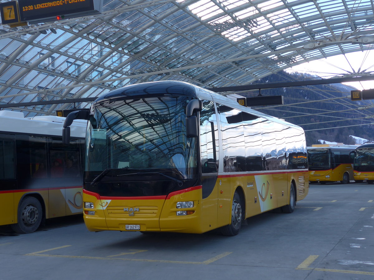 (187'421) - PostAuto Graubnden - GR 162'973 - MAN am 26. Dezember 2017 in Chur, Postautostation