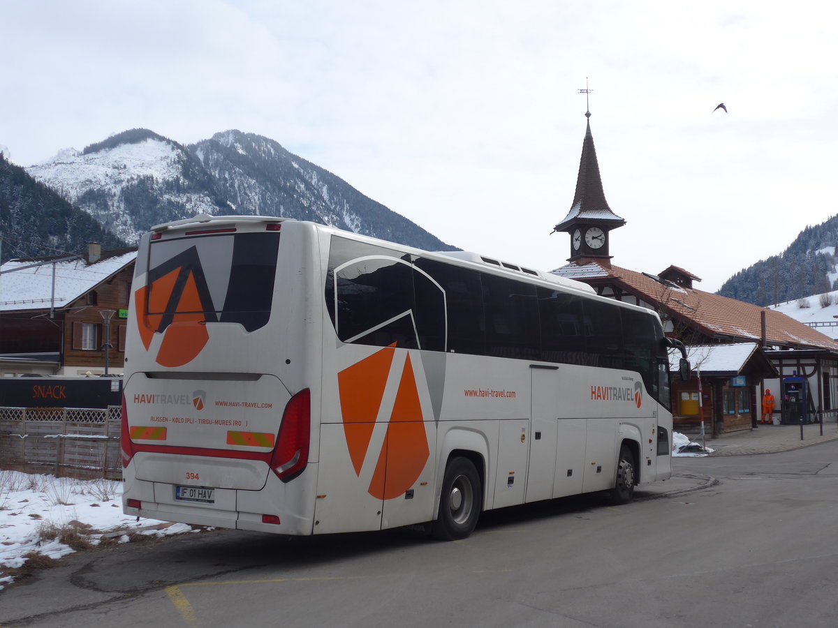 (188'198) - Aus Rumnien: Havi Travel, Turgu-Mures - Nr. 394/IF 01 HAV - Scania/Higer am 4. Februar 2018 beim Bahnhof Zweisimmen