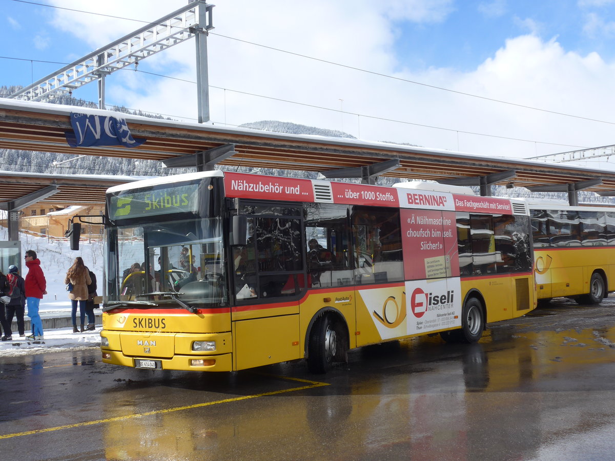 (188'476) - AVG Meiringen - Nr. 72/BE 614'040 - MAN/Gppel am 12. Februar 2018 beim Bahnhof Gstaad (Einsatz PostAuto)