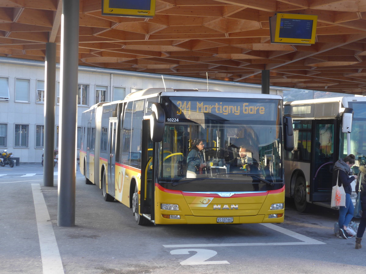 (188'936) - Buchard, Leytron - VS 107'667 - MAN am 18. Februar 2018 beim Bahnhof Sion