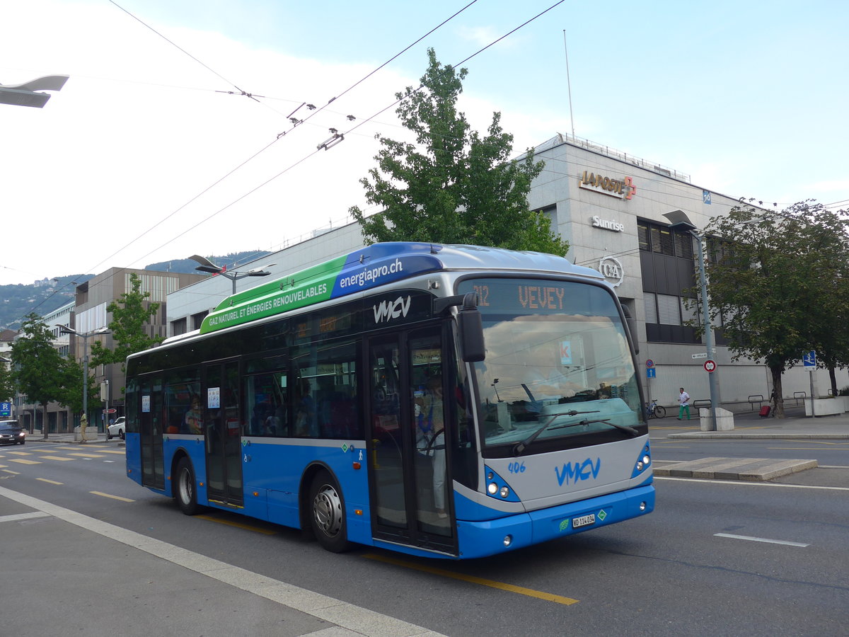 (195'711) - VMCV Clarens - Nr. 406/VD 114'034 - Van Hool (ex Nr. 106) am 6. August 2018 beim Bahnhof Vevey