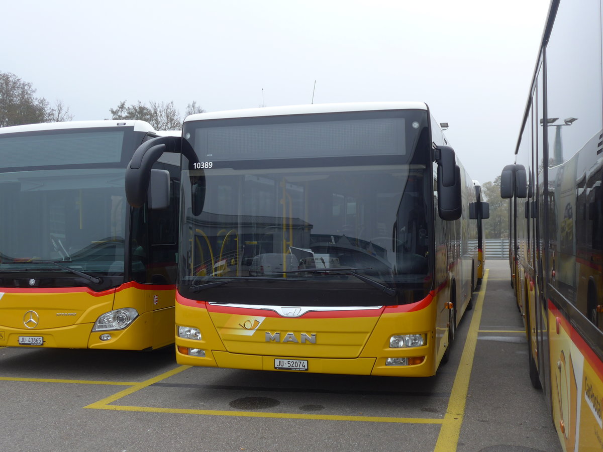 (199'210) - CarPostal Ouest - JU 52'074 - MAN (ex Nr. 62) am 4. November 2018 in Develier, Parkplatz