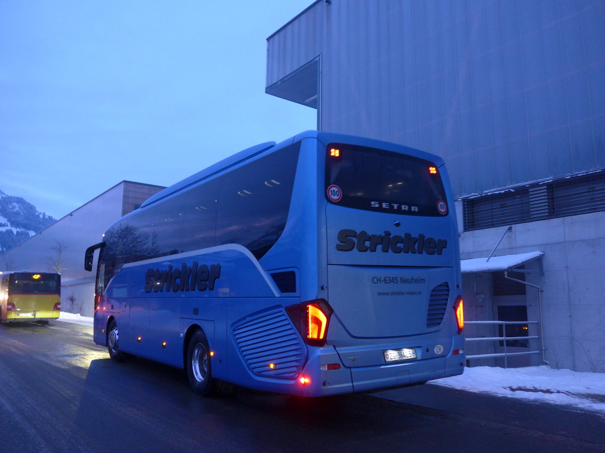 (200'686) - Strickler, Neuheim - ZG 36'425 - Setra am 12. Januar 2019 beim Bahnhof Frutigen