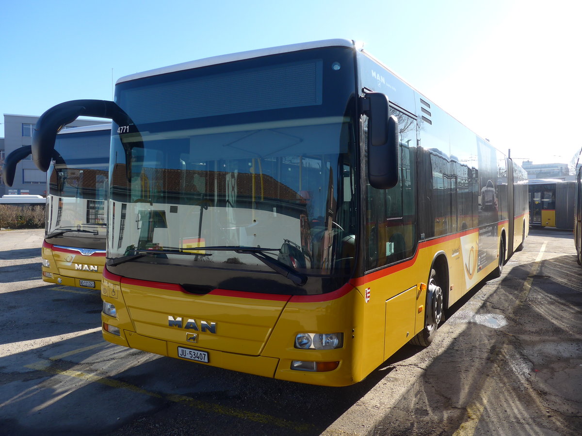 (201'628) - CarPostal Ouest - JU 53'407 - MAN (ex Nr. 37) am 16. Februar 2019 in Yverdon, Garage