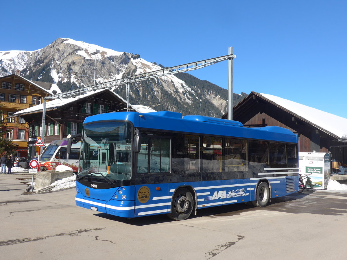 (201'668) - AFA Adelboden - Nr. 57/BE 272'798 - Scania/Hess am 17. Februar 2019 beim Bahnhof Lenk