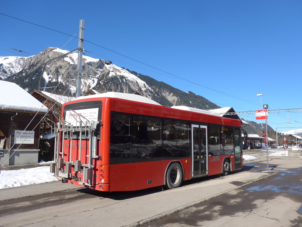 (201'671) - AFA Adelboden - Nr. 56/BE 611'030 - Scania/Hess am 17. Februar 2019 beim Bahnhof Lenk