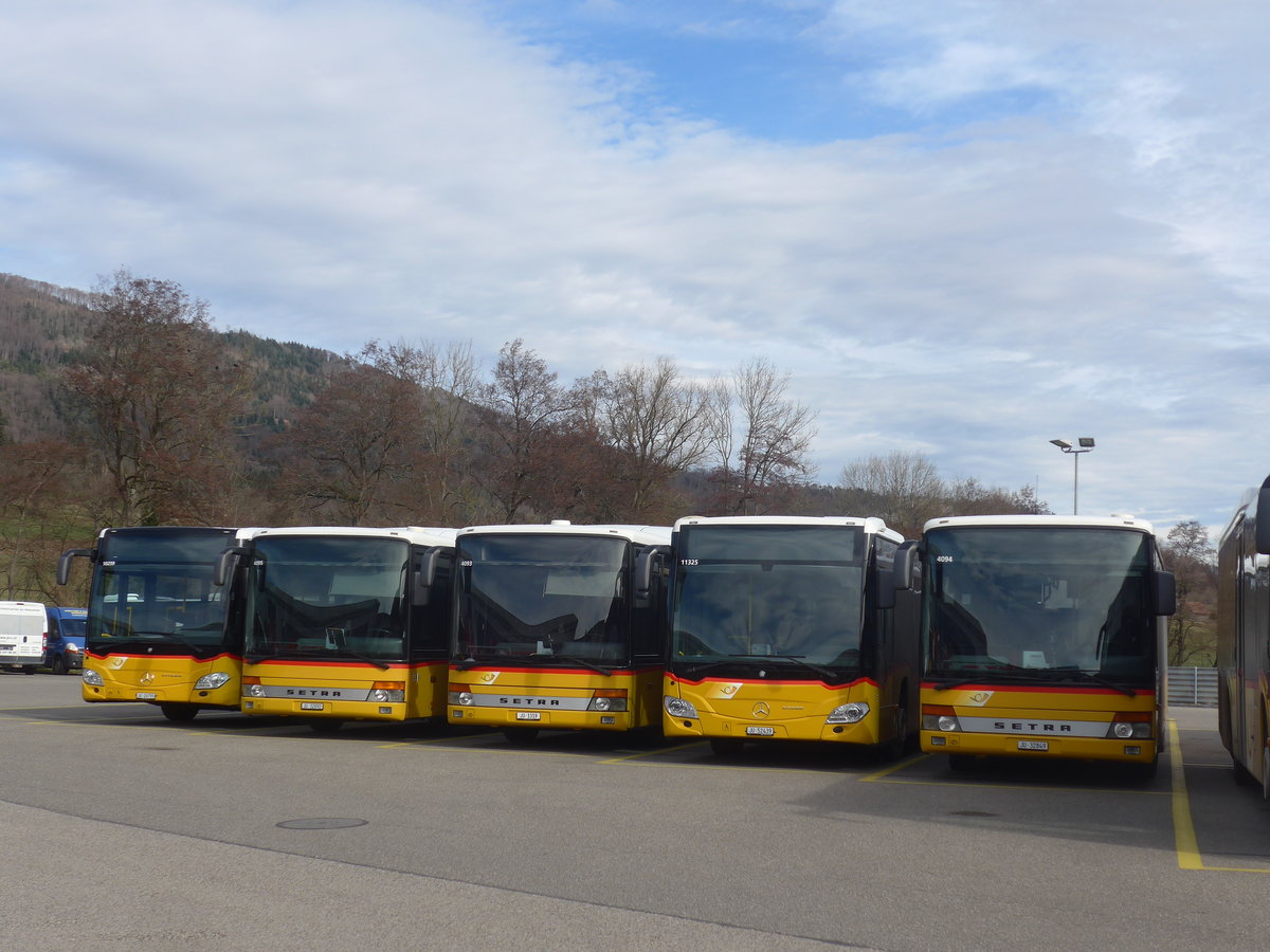 (214'312) - CarPostal Ouest - JU 26'790 - Mercedes + JU 32'892 - Setra (ex Nr. 19) + JU 1319 - Setra (ex Nr. 52; ex Stucki, Porrentruy Nr. 21) + JU 52'439 - Mercedes + JU 32'849 - Setra (ex Nr. 18) am 16. Februar 2020 in Develier, Parkplatz