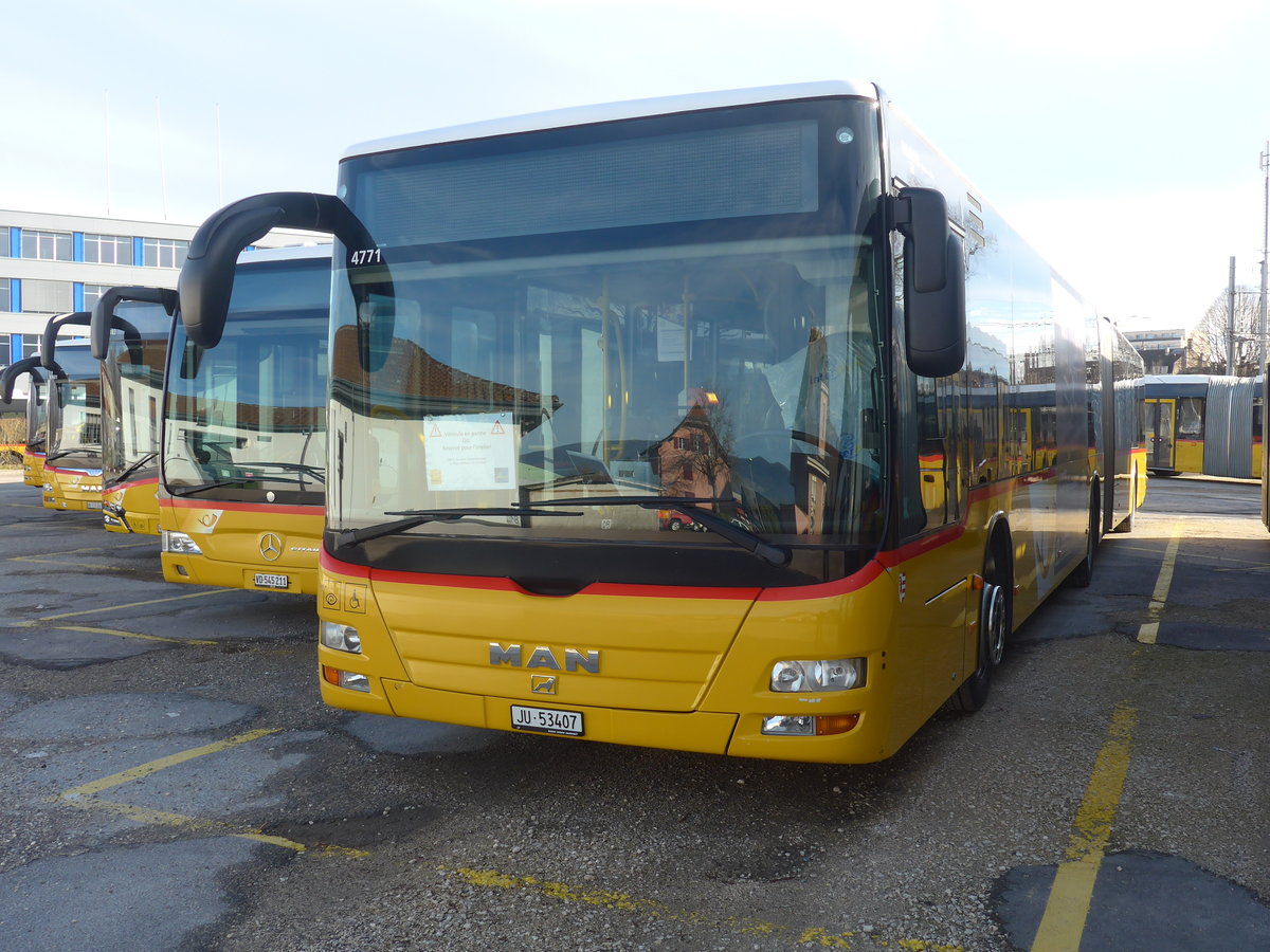 (214'352) - CarPostal Ouest - JU 53'407 - MAN (ex Nr. 37) am 16. Februar 2020 in Yverdon, Garage