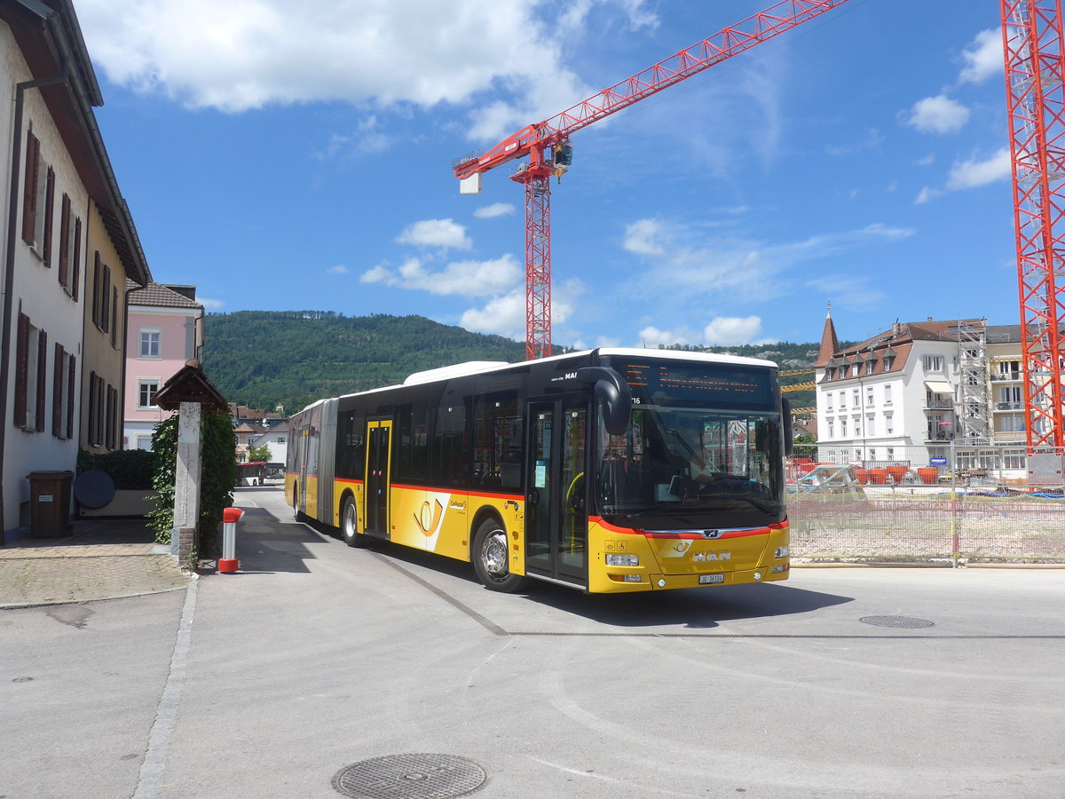 (218'379) - CarPostal Ouest - JU 36'104 - MAN am 4. Juli 2020 beim Bahnhof Delmont