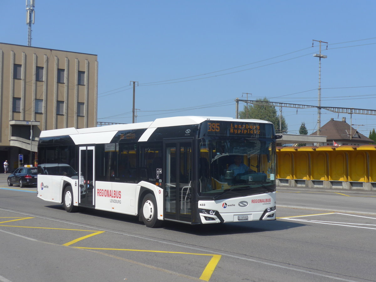 (220'763) - Knecht, Windisch - Nr. 433/AG 369'002 - Solaris am 13. September 2020 beim Bahnhof Lenzburg (ohne Aussenspiegel!)