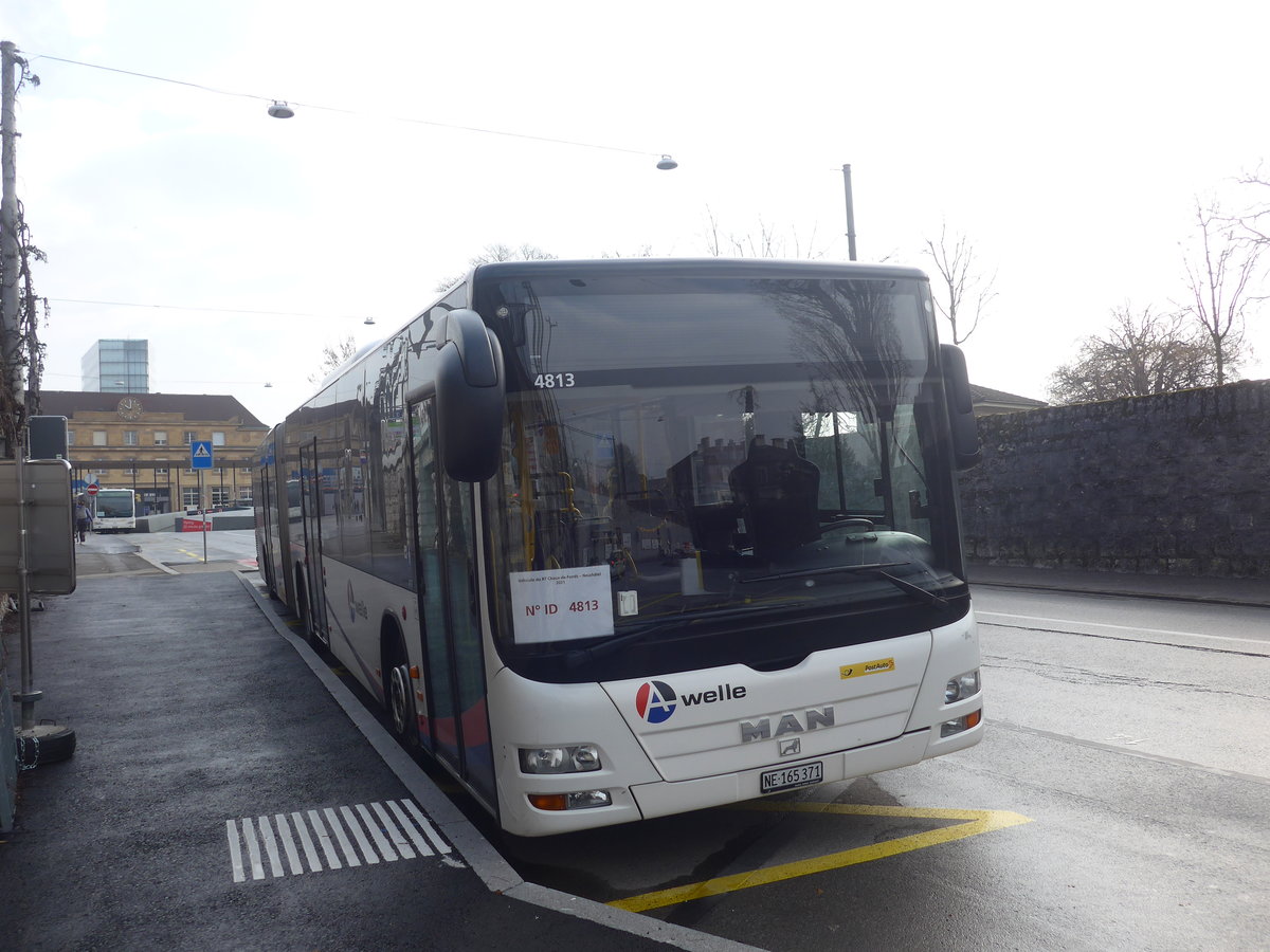 (223'997) - PostAuto Nordschweiz - NE 165'371 - MAN (ex AG 271'181) am 7. Mrz 2021 beim Bahnhof Neuchtel