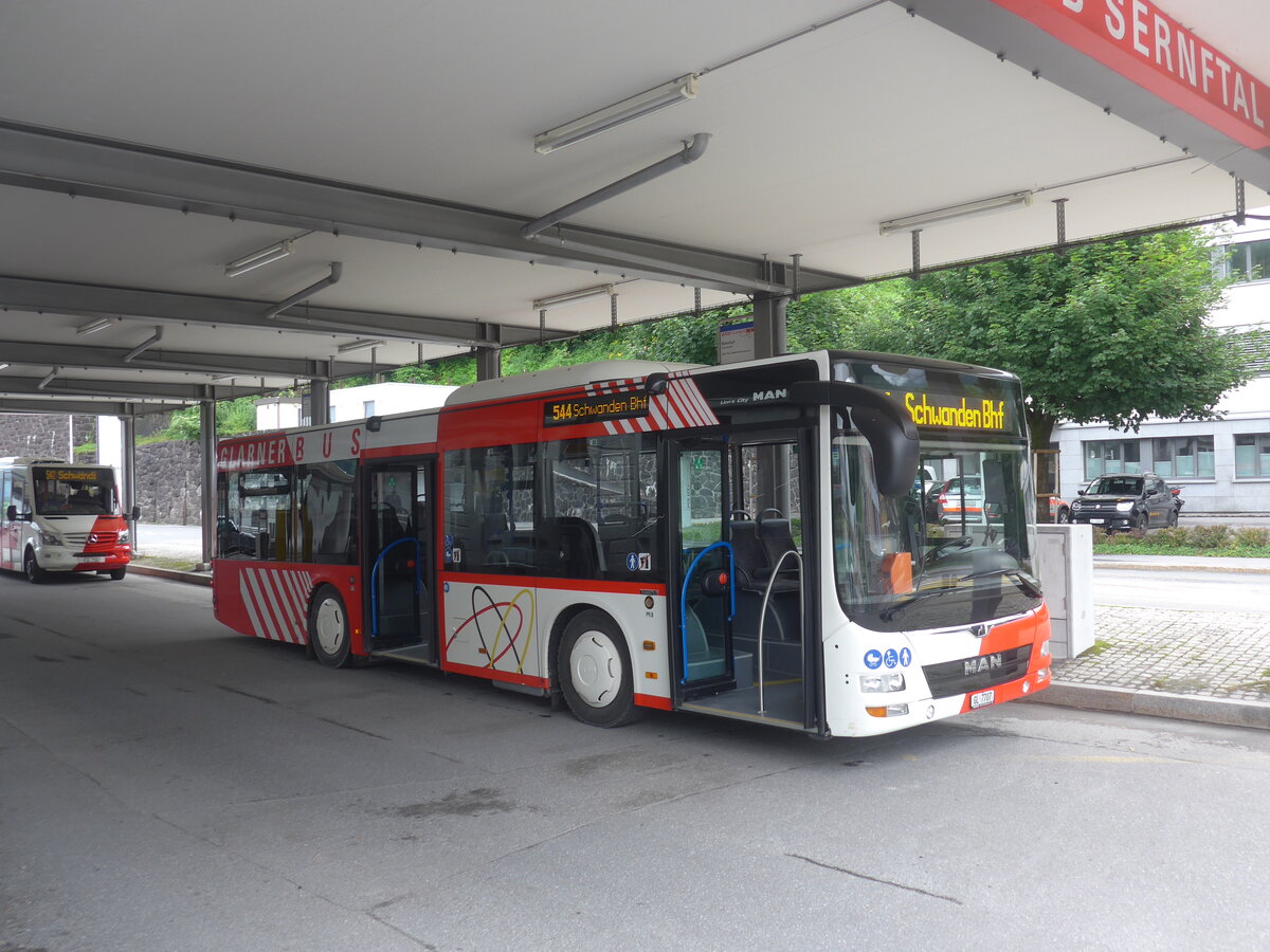 (226'765) - AS Engi - Nr. 7/GL 7707 - MAN am 25. Juli 2021 beim Bahnhof Schwanden