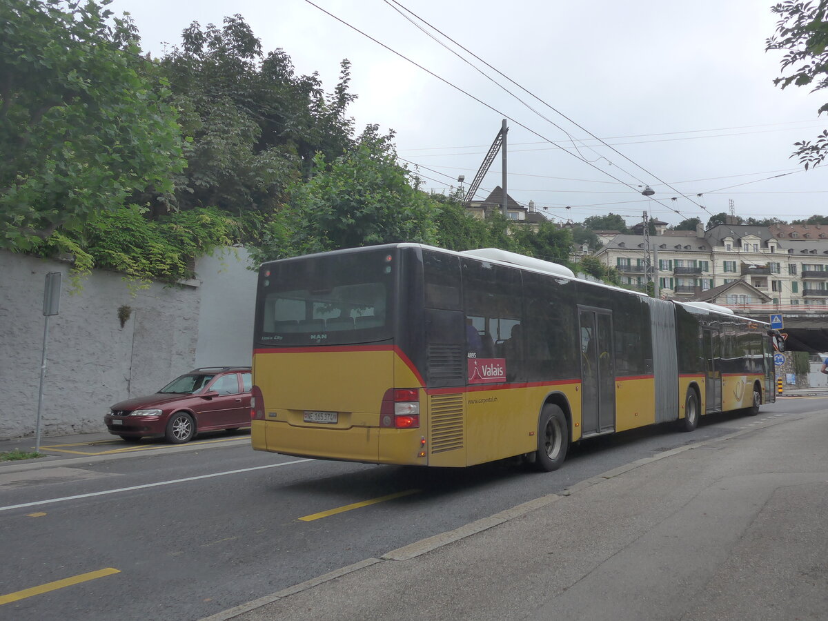 (226'924) - Buchard, Leytron - NE 165'374 - MAN (ex VS 141'737; ex Nr. 158) am 1. August 2021 in Neuchtel, Avenue de la Gare (Einsatz CarPostal)