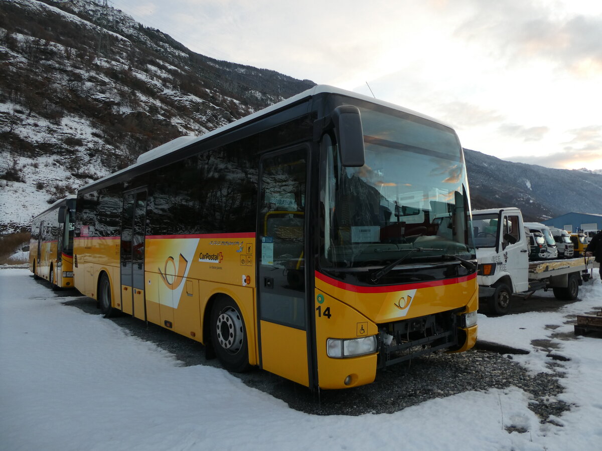 (231'192) - PostAuto Wallis - Nr. 14 - Irisbus (ex Theytaz, Sion) am 12. Dezember 2021 in Saxon, Garage Visa