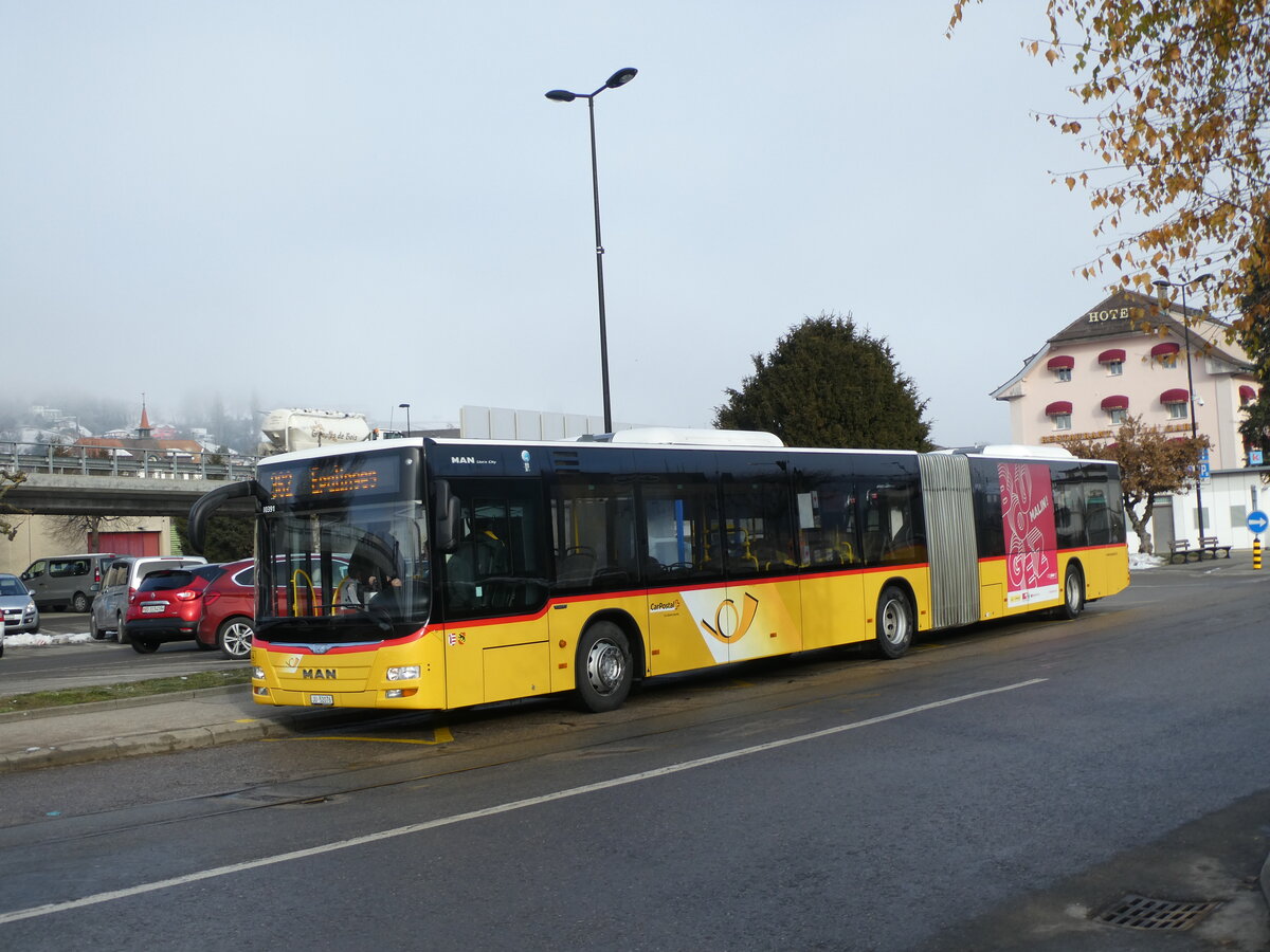 (231'247) - CarPostal Ouest - JU 52'076 - MAN (ex Nr. 38) am 14. Dezember 2021 beim Bahnhof Moudon