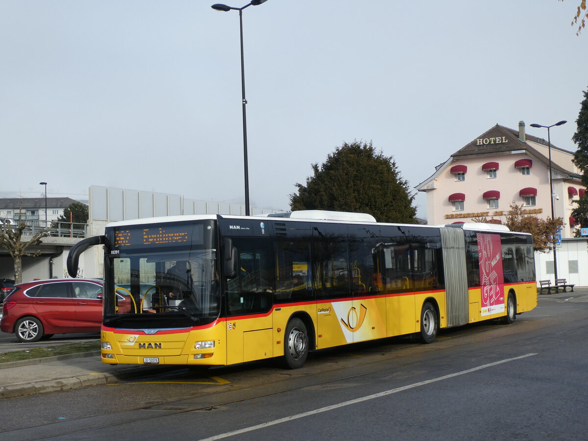 (231'248) - CarPostal Ouest - JU 52'076 - MAN (ex Nr. 38) am 14. Dezember 2021 beim Bahnhof Moudon